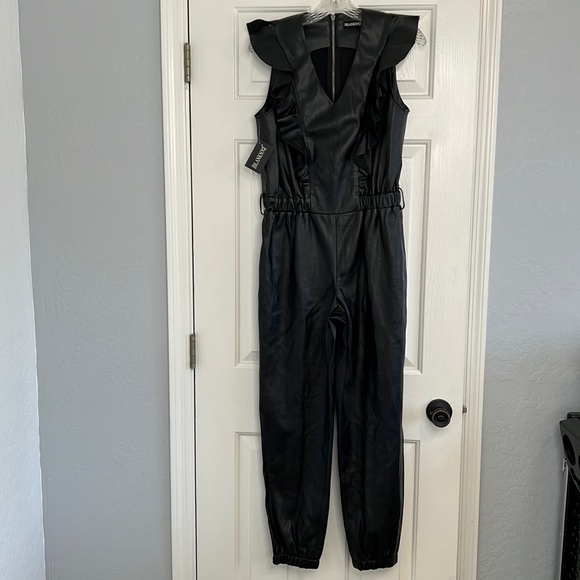 NWT BlankNYC black faux leather ruffle sleeve jumpsuit size small - Picture 1 of 14